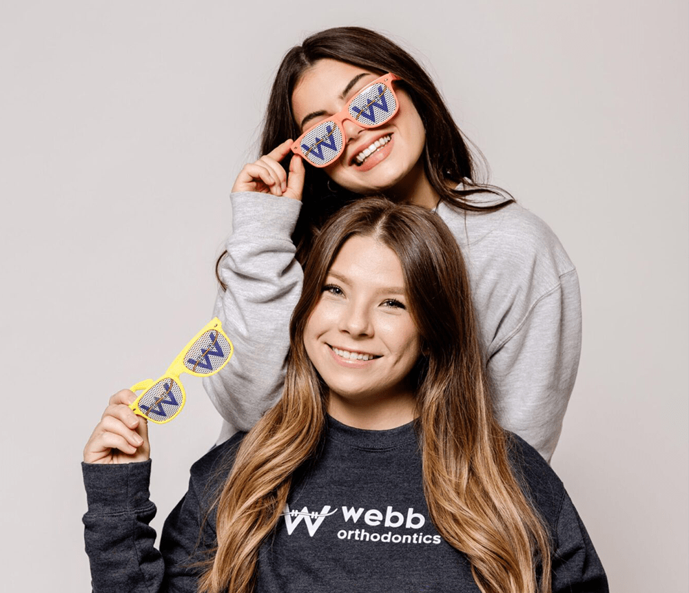 two girls smiling