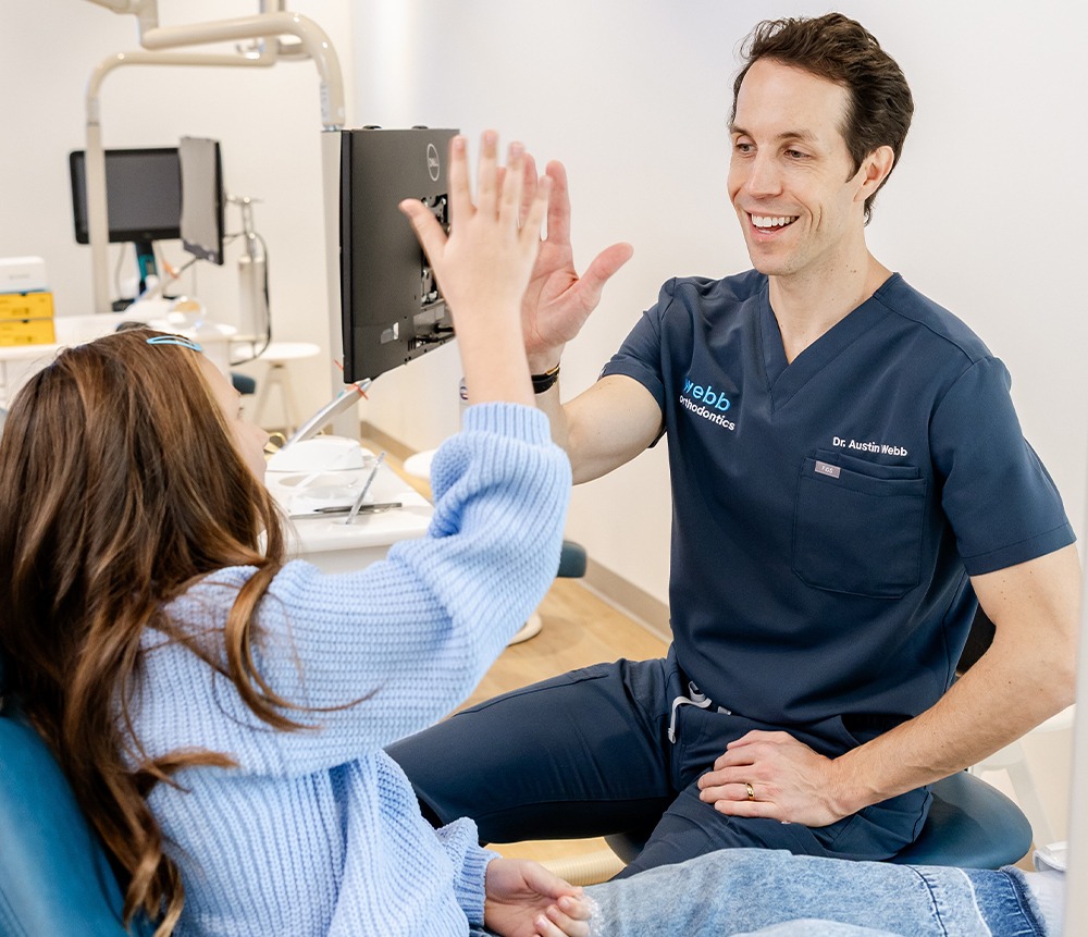 teen girl smiling at appointment